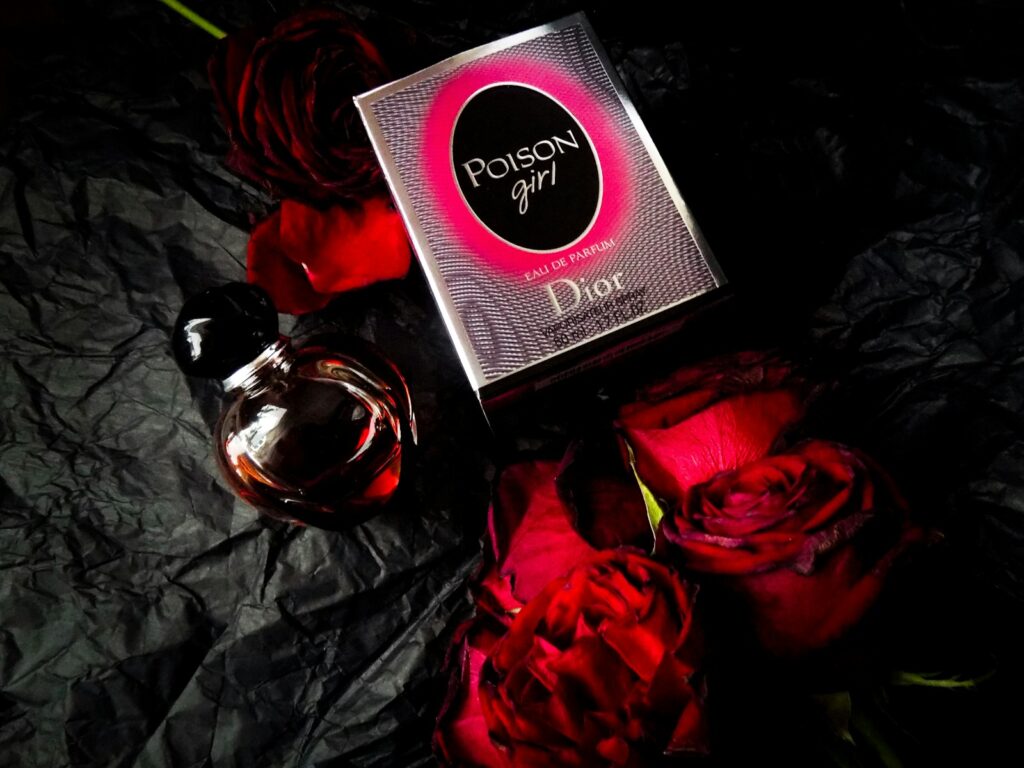 red rose and gold perfume bottle